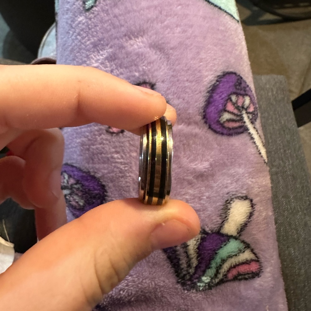 Size 10 stainless ring with gold and black stripes